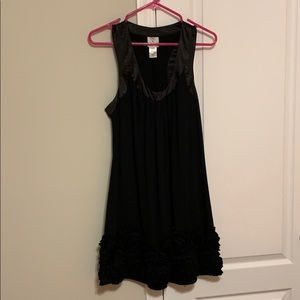 Black racerback dress with floral detail at bottom